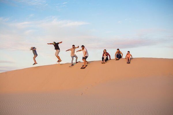 Sandboarding at the Timlalin Dunes